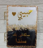 white and black notebook