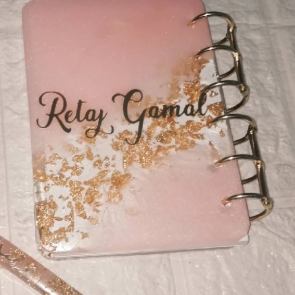 Pink with golden paper notebook
