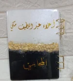 white and black notebook - Image 2